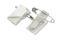 Krokoclip aus Metall,<br> selbstklebend,<br> mit Sicherheitsnadel